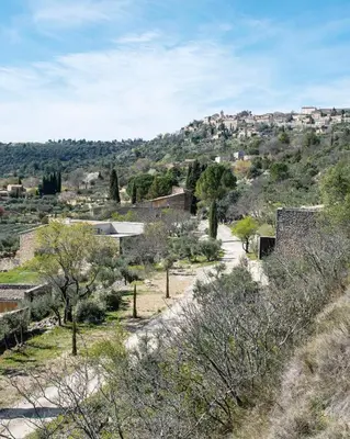 a view of a village from a hill at l'Atelier des Milles Roches in Gordes