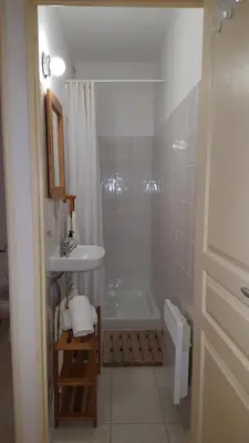 a bathroom with a shower and a sink and a tub at Provence Luberon Goult Gite Mafasuza in Goult