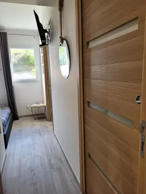 a door in a room with a hallway at Les Prairies de l'Encrême in Céreste