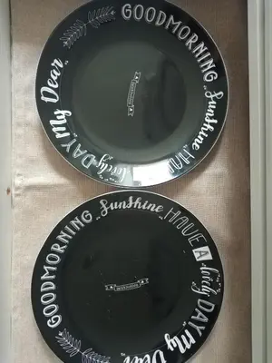two plates sitting on top of a table at Au Coeur du Luberon in Cavaillon