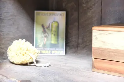 a book sitting next to a pile of white rice next to a pile of popcorn at charming house with private pool in the heart of the village of aureille in the alpilles, 6 people. in Aureille