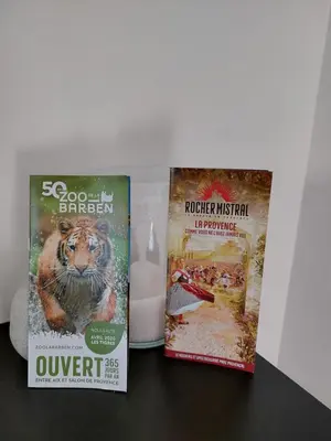 two brochures of a product with a picture of a tiger at La Micocoule in La Barben