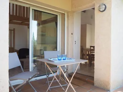 a white table and chairs in a room with a dining room at Cottage in Luberon near Apt Market in Apt