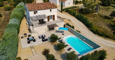 an aerial view of a house with a swimming pool at Le Petit Rossignol in Apt