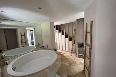 a large bathroom with two sinks and two mirrors at Villa de 300 m au coeur du Luberon au calme sans in Maubec