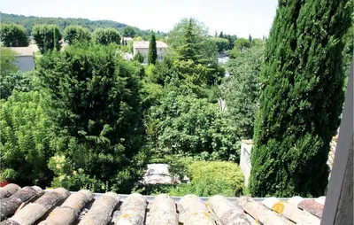 an overhead view of a garden with trees and a roof at Nice Home In St Didier With Kitchen in Saint-Didier