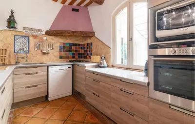 a kitchen with a sink and a stove top oven at 4 Bedroom Pet Friendly Home In Apt in Apt