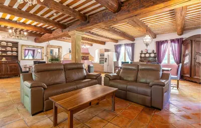 a living room with two couches and a table at 4 Bedroom Pet Friendly Home In Apt in Apt
