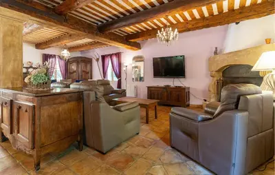 a living room with leather furniture and a television at 4 Bedroom Pet Friendly Home In Apt in Apt