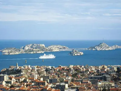 a city with a cruise ship in the water at Cozy Vacation House with Pool, Vernègues in Vernègues