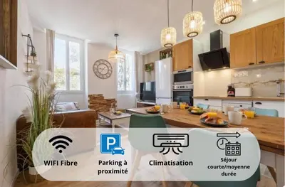 a large kitchen with a table in a room at Woods Natural Hyper centre Fontaine Moussue in Salon-de-Provence