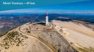 an aerial view of a mountain with a tower on top at Les Bastidons de l'Isle - Le Saumane - 3 étoiles in LʼIsle-sur-la-Sorgue