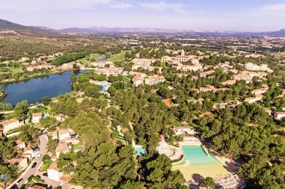 an aerial view of a resort with a lake at Village Pont Royal en Provence - maeva Home - Studio 5 Personnes Selection MAE-4892 in Mallemort