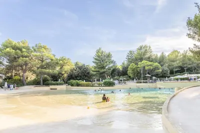 a group of people swimming in a swimming pool at Village Pont Royal en Provence - maeva Home - Appartement 2 pièces 6 personnes climatisé - Prestige MAE-4537 in Mallemort