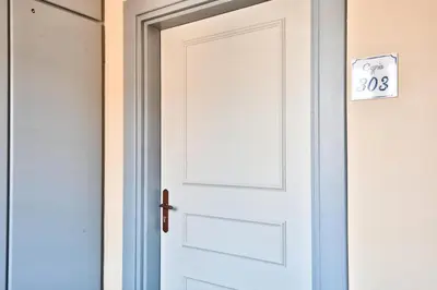 an open white door with a sign on it at Les Coteaux de Pont Royal en Provence - maeva Home - Appartement 3 Pièces 6 Personnes - Sélection MAE-5989 in Mallemort