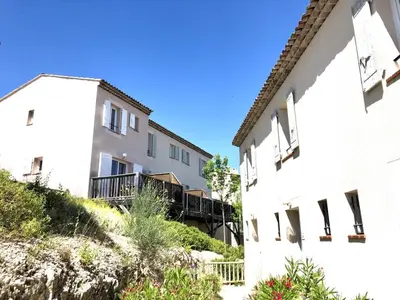 two white buildings next to each other at Maison de Vacances en Provence avec Piscine, Golf à Proximité, Fibre et Linge Haut de Gamme - FR-1-658-9 in Mallemort
