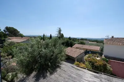 a view of a garden from the roof of a house at nice house with private pool - 6 persons in the center of the village of mérindol in the luberon in provence in Mérindol