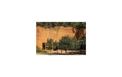 a group of trees in front of a rock formation at 3 Bedroom Gorgeous Home In Gargas in Gargas