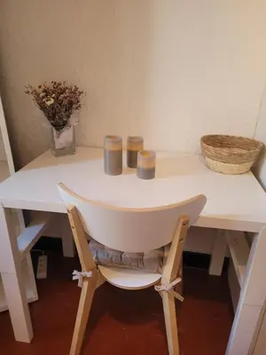 a white table with two cups on top of it at Aix-en-Provence Superbe studio centre historique in Aix-en-Provence