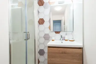 a bathroom with a sink and a shower at Village Pont Royal en Provence - maeva Home - Appartement cosy et climatisé 3 pièces 6 personnes - Prestige - super Home MAE-3914 in Mallemort