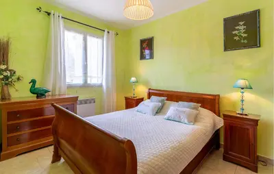 a bedroom with a bed and a window at Beautiful Home In Lauris With Wifi in Lauris