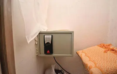 a television on a wall with a remote control at 1 Bedroom Beautiful Home In Saignon in Saignon