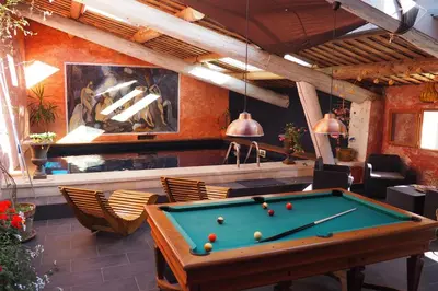 a billiard room with a pool table in it at Chambres d'Hôtes Le relais des marmottes en Luberon in Lagnes