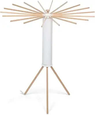 a wooden starburst floor lamp with a metal pole at Exclusif Appart piscine chauffée de luxe 10 min centre AixenPc Belvoir SISSI in Aix-en-Provence