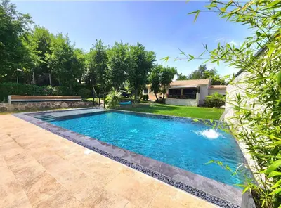 a swimming pool in the backyard of a house at Maison en provence vue sur le luberon in Maubec