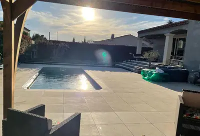 a swimming pool in a yard with a house at Proche Saint Rémy de Provence in Mollégès