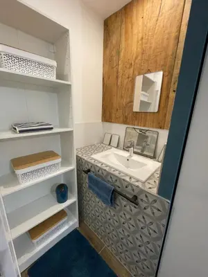 a bathroom with a sink and a mirror at Proche Saint Rémy de Provence in Mollégès