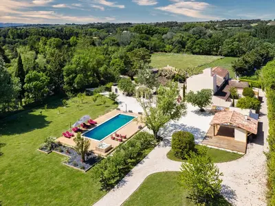 an aerial view of an estate with a swimming pool at L'Insoupçonnée Saint Rémy de Provence by A Pinch Of Soul in Noves