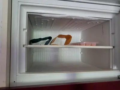 an open refrigerator with two chairs in it at Les demeures du Ventoux in Aubignan