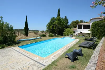 a swimming pool in the backyard of a house at La Tour- Pigeonnier Provençal - Mas des Sous Bois in Ventabren