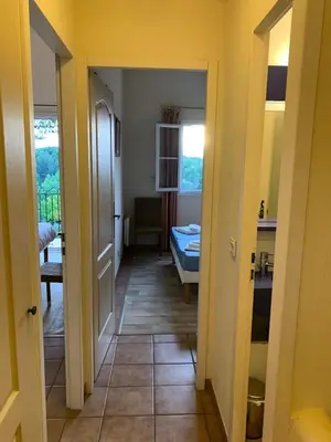 a hallway with a hallway leading to a room at Les Maisons de Pont Royal en Provence - maeva Home - Maison climatisée pour 8 Personnes avec jardin privatif et terrasse MAE-2283 in Mallemort