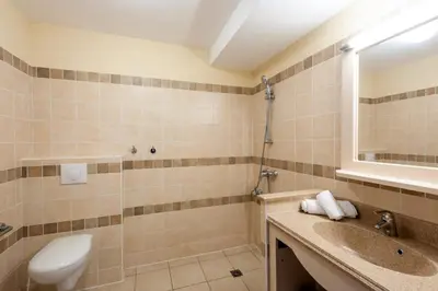 a bathroom with a toilet and a sink at Les Coteaux de Pont Royal en Provence - maeva Home - Appartement 2 Pièces 4 Personnes - Confort MAE-6002 in Mallemort