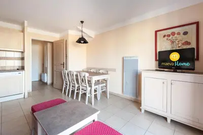 a living room with a kitchen and a dining room at Les Coteaux de Pont Royal en Provence - maeva Home - Maison 3 Pièces 6 Personnes - Sélection MAE-8177 in Mallemort