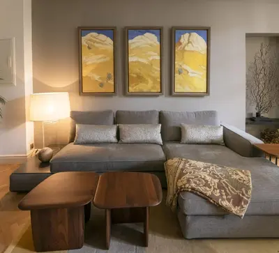 a living room with a couch and a table at Villa Amara in Aix-en-Provence