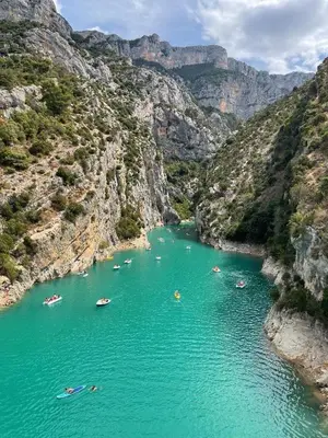 a group of boats in a river in a canyon at Gite Les Robiniers in Beaumont-de-Pertuis