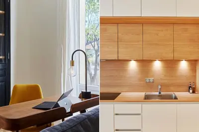 a kitchen with a sink and a table with a laptop at Appartement exceptionnel avec parking Centre-ville Aix-en-Provence in Aix-en-Provence