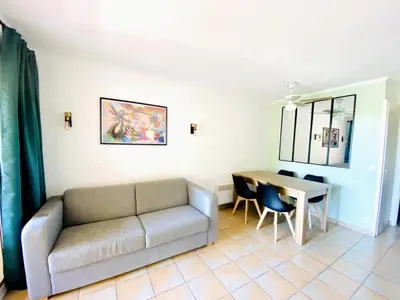 a living room with a couch and a table at Village Pont Royal en Provence - maeva Home - Appartement 2 pièces 5 personnes - Sélection MAE-8624 in Mallemort