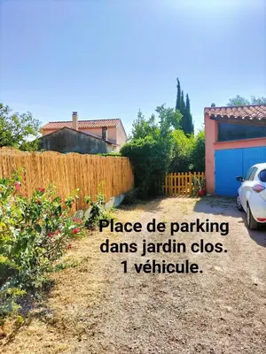 a yard with a fence and a car in a driveway at Calme et Intimité proche Avignon Piscine options au choix privée ou partagée de juin à octobre in Morières-lès-Avignon