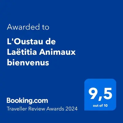 a screenshot of a phone with the text awarded to l australia de lat at L'Oustau de Laëtitia Animaux bienvenus in Fontaine-de-Vaucluse