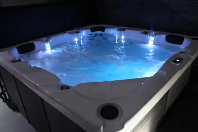 a jacuzzi tub with lights in a bathroom at Maison avec piscine, jacuzzi et sauna privatifs - Mas de Nebbas in Aix-en-Provence