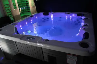 a jacuzzi tub with lights in a room at Maison avec piscine, jacuzzi et sauna privatifs - Mas de Nebbas in Aix-en-Provence