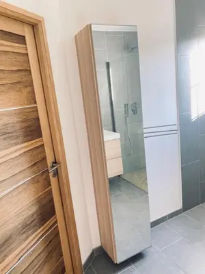 a bathroom with a shower and a glass door at Jolie maison de 110 m 2, pour 6 personnes, au calme, avec piscine in Les Cordiers