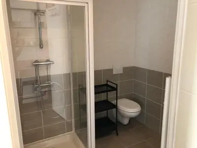 a bathroom with a shower and a toilet at Ma place au sud terrasse à 2 pas d’Aix in Éguilles