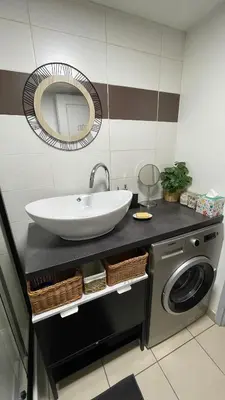 a bathroom with a sink and a washing machine at Addis in Salon-de-Provence