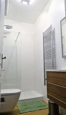 a bathroom with a shower and a toilet and a sink at BLUE FOUNTAIN Luxueux Studio Aix Centre Historique -WIFI-SMART TV- in Aix-en-Provence