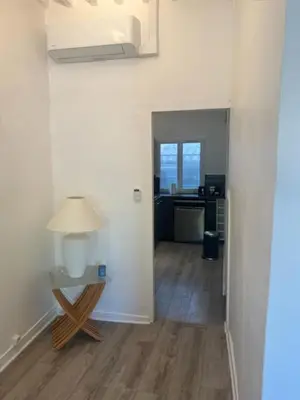 a bedroom with a bed with birds on the wall at COSY PLACE Aix-en-Provence, centre historique, WIFI Fibre Optique gratuit in Aix-en-Provence